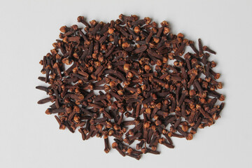 Dried clove or he aromatic flower buds of Syzygium aromaticum. Isolated on white background, flat lay or top view