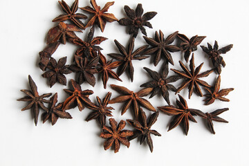 Dried star anise or Illicium verum, on white background, flat lay