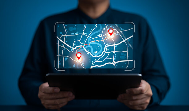 GPS location system. Businessman marks location points and search addresses on geolocation map application. Pin destination for travel or finding business places in GPS Satellite coordinates system.