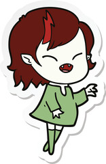 sticker of a cartoon laughing vampire girl