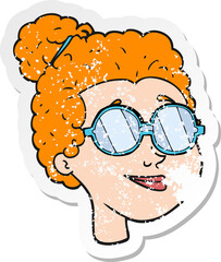 retro distressed sticker of a cartoon woman wearing spectacles