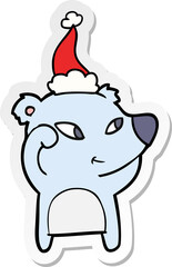 cute sticker cartoon of a bear wearing santa hat