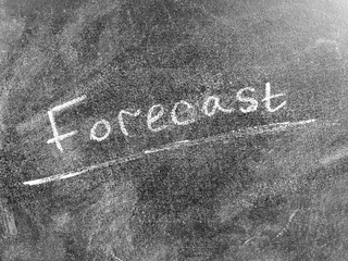 Fototapeta premium FORECAST text, chalk inscription on a blackboard. Forecasting, forecast, analysis, concept.