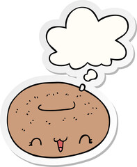 cute cartoon donut and thought bubble as a printed sticker