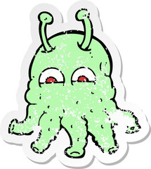 retro distressed sticker of a cartoon space alien