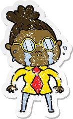 distressed sticker of a cartoon crying woman wearing spectacles