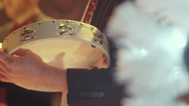 Man playing on tambourine drum music Instruments