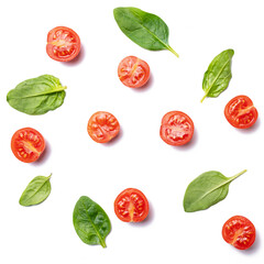 food background cherry tomatoes and spinach leaves isolated on white background.