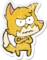 distressed sticker of a cartoon annoyed fox