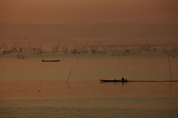 Fototapeta premium Huai Luang reservoir is a large reservoir for agriculture ,fisheries and water supply. It is a tourist attraction with beautiful landscape and local lifestyle.. UdonThani province,Thailand