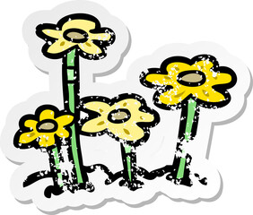 distressed sticker of a cartoon flowers