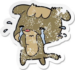 distressed sticker of a cartoon sad dog