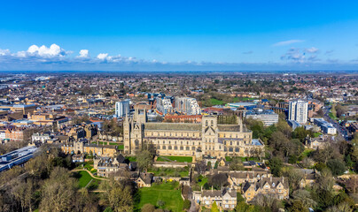 An aerial view towards the cathedral and centre of Peterborough, UK on a bright sunny day