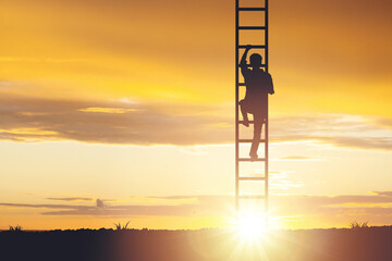 Silhouette of a man crawling on a staircase to the sky, concept of motivation and success