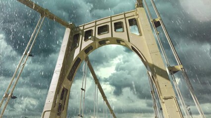 A forward driving dolly shot over the 9th Street Bridge over the Allegheny River in downtown Pittsburgh, Pennsylvania during a winter snow.