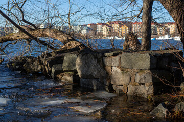 Stockholm old wall near water in winter