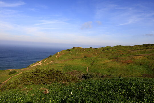 Cabo da Roca is a cape which forms the westernmost point of the Sintra Mountain Range, of mainland Portugal