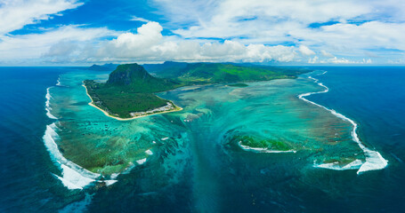 Aerial view: Le Morne Brabant mountain with beautiful lagoon and underwater waterfall illusion,...