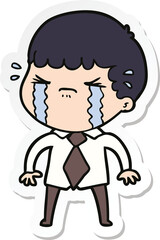 sticker of a cartoon man crying