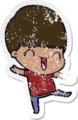 distressed sticker of a happy cartoon boy