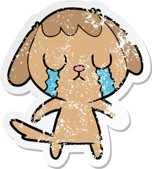 distressed sticker of a cute cartoon dog crying