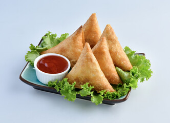 Samosa, a famous snack filled with spicy chicken and vegetables