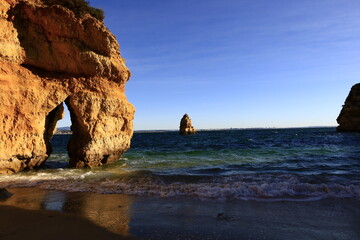 Ponta da Piedade is a headland with a group of rock formations along the coastline of the town of...