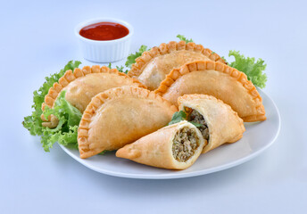 Delicious Half Circle Shape Samosa, stuffed with spicy chicken and herbs