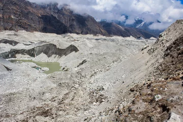 Foto op Plexiglas Cho Oyu Ngozumpa Glacier, Nepal's largest glacier with massive debris, stone, ice and clay deposits, flows from Cho Oyu and is the headwaters of the Dudh Kosi that travels over 1500 kms to the Bay of Bengal