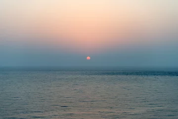 Gardinen View of the sunset on the sea © 안구정화