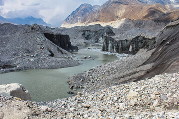 Melt pools inside the Ngozumpa Glacier, Nepal's largest glacier with massive debris, stone, ice and clay deposits flowing from Mount Cho Oyu and giving rise to the Dudh Kosi river in Nepal