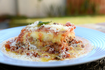 lasagna with red bolognese sauce, typical Italian cuisine pasta