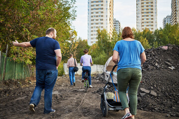  Group of residents of Losiniy Ostrov district at area of illegal base for processing and sorting of construction waste