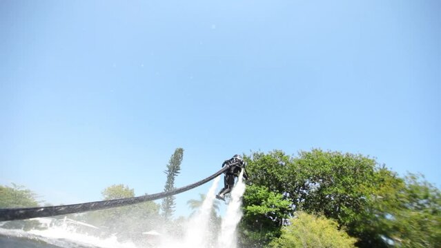 Low shot in lake of water jetpack flying around
