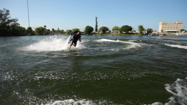 Cinematic shot circling around water jetpack - wide shot