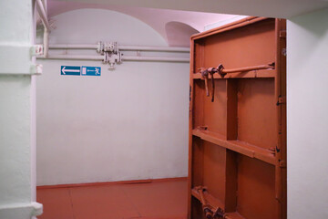 Doorways with metal doors in hallway leading into Stalins bunker in Samara, Russia