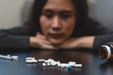 Anti drug, drug addict asian young woman, girl hand reaching for syringe, medicament with narcotic...