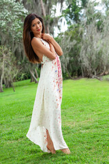 Beautiful Asian Young Woman Girl Outdoors in a White Dress - 751628283