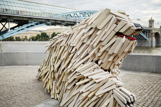 Unique wooden sculpture of a dog breed Komondor by Gabor Miklos Szoke, internationally known sculptor, on Pushkinskaya Embankment in Gorky Park