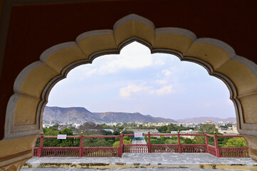 View of Jaipur City During Twilight Through Archway of City Palace