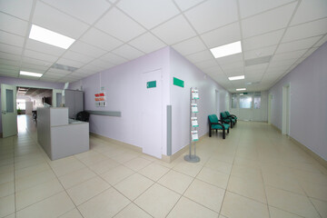  empty corridor with reception and chairs in multidisciplinary Clinic Center Endosurgery and Lithotripsy