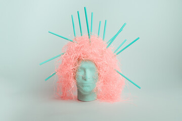 Abstract concept of a scatterbrain, modelhead with crazy hair and straws