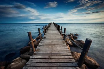 Deurstickers The wooden jetty leads far out to sea. AI generated. © serperm73
