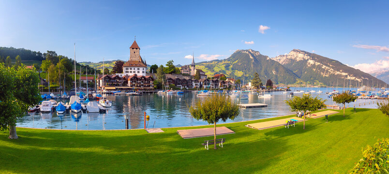 Panorama with Spiez Church and Castle on Lake Thun in Swiss canton of Bern, Spiez, Switzerland.