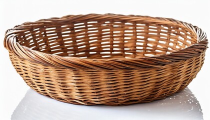 oval brown wicker basket made of natural vine isolated - obrazy, fototapety, plakaty