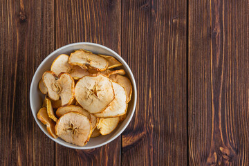 Dried sliced apples in a white bowl