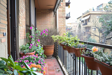 Fototapeta na wymiar A balcony with a Mediterranean style and a potted plants