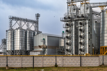 silos on agro-industrial complex with seed cleaning and drying line for grain storage