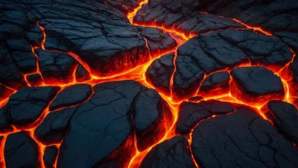 Fototapeten abstract shot of a lava stream flowing between black rocks in fiery red tones capturing the intensity of the volcanic landscapes © Marino Bocelli