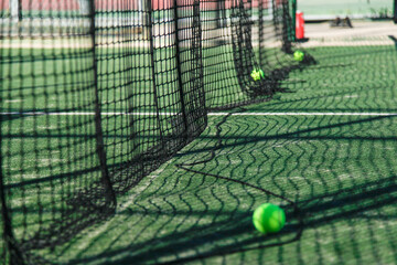 Paddle court with green balls